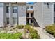 Multi-unit building with visible stairs to upper levels, and front-facing landscaped beds at 4709 Puritan Cir # 702, Tampa, FL 33617
