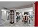 Open-concept dining and kitchen area features grey floors and modern decor at 4709 Puritan Cir # 702, Tampa, FL 33617