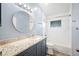 Nicely renovated bathroom features granite counters and updated finishes at 4761 Stoneview Cir, Oldsmar, FL 34677