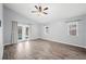 Bright bedroom with French doors leading to the pool area, and tile floors at 4761 Stoneview Cir, Oldsmar, FL 34677