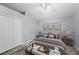 Bedroom featuring a comfortable king size bed and modern decor at 4761 Stoneview Cir, Oldsmar, FL 34677