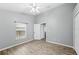 Well-lit bedroom offers ample space and neutral finishes at 4761 Stoneview Cir, Oldsmar, FL 34677