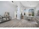 Bright dining room with high ceilings, modern decor, and lots of natural light at 4761 Stoneview Cir, Oldsmar, FL 34677