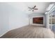 Bright living room with vaulted ceilings and sliding glass doors to the pool area at 4761 Stoneview Cir, Oldsmar, FL 34677