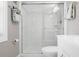 Clean bathroom featuring a glass-enclosed shower and modern fixtures at 4858 Coquina Key Se Dr # C, St Petersburg, FL 33705