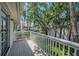 Charming balcony view with lush trees and community views in a desirable location at 5115 S Jules Verne Ct, Tampa, FL 33611