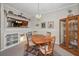 The dining room has carpet floors, and the dining room wall has a kitchen view at 5115 S Jules Verne Ct, Tampa, FL 33611