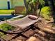 Enjoy the serenity of this backyard oasis featuring a relaxing hammock shaded by lush greenery and mature trees at 530 59Th Ave, St Pete Beach, FL 33706