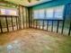 A room is under renovation, exposing the wall structure and showing tile flooring at 530 59Th Ave, St Pete Beach, FL 33706