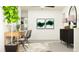 Bright office space with a desk, chairs, and modern decor, perfect for a productive work-from-home environment at 6492 Top Hill Dr, New Port Richey, FL 34655