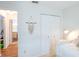 Bright bedroom with a daybed, closet, and natural light at 6805 S Gabrielle St, Tampa, FL 33611