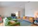 Spacious living room with comfortable sofas, modern decor, and plenty of natural light at 6805 S Gabrielle St, Tampa, FL 33611