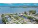 An aerial view of a home with canal access and beautiful water views in a waterfront community at 814 Seabreeze Dr, Ruskin, FL 33570