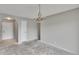Bright dining room features light gray walls, a chandelier, and a doorway leading to another room at 814 Seabreeze Dr, Ruskin, FL 33570
