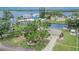 Inviting single-story home with mature trees, well-maintained lawn, and private canal access at 814 Seabreeze Dr, Ruskin, FL 33570