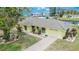 Charming home with a well-maintained lawn, attached garage, and inviting curb appeal at 814 Seabreeze Dr, Ruskin, FL 33570