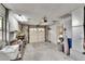 Spacious garage with sink, utility shelving and access to the home's interior at 814 Seabreeze Dr, Ruskin, FL 33570