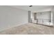 Bright living room features light gray walls, and a decorative railing offering style and sophistication at 814 Seabreeze Dr, Ruskin, FL 33570