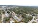 Expansive aerial view of a neighborhood featuring tree-lined streets and well-maintained homes at 8347 41St N Ave, St Petersburg, FL 33709