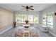 Bright dining room with large windows and a view of the outdoor space at 8347 41St N Ave, St Petersburg, FL 33709