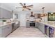 Well-appointed kitchen with stainless steel appliances, stylish cabinets, and ample counter space at 8347 41St N Ave, St Petersburg, FL 33709