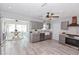Open kitchen with gray cabinets, modern appliances, and an adjoining dining area at 8347 41St N Ave, St Petersburg, FL 33709