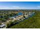Residential waterfront homes with mature trees at 9301 Sun Isle Ne Dr, St Petersburg, FL 33702