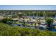 Waterfront home with boat dock, lush landscaping and water access at 9301 Sun Isle Ne Dr, St Petersburg, FL 33702