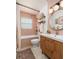 Stylish bathroom featuring modern fixtures, a vanity, and a shower-tub combination at 9301 Sun Isle Ne Dr, St Petersburg, FL 33702