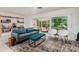 Cozy living room with an abundance of natural light and stylish furniture at 9301 Sun Isle Ne Dr, St Petersburg, FL 33702