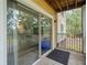 Private balcony offers a relaxing outdoor space, views of mature trees, and natural light at 10028 Strafford Oak Ct # 712, Tampa, FL 33624