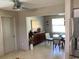 Cozy dining area adjacent to the kitchen with a modern table and a stylish buffet cabinet at 101 Madonna Blvd, St Petersburg, FL 33715