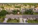 Aerial view of home in a community with a golf course at 1046 Almondwood Dr, Trinity, FL 34655