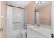 Bathroom with shower-tub combination and updated fixtures at 1046 Almondwood Dr, Trinity, FL 34655