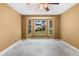 Bedroom featuring a large bay window offering a view to the outdoors at 1046 Almondwood Dr, Trinity, FL 34655
