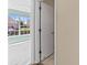 Bright hallway with view to outdoors at 1046 Almondwood Dr, Trinity, FL 34655