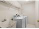 Laundry room with washer, dryer and a utility sink at 1046 Almondwood Dr, Trinity, FL 34655