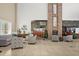Inviting lobby area with cozy seating, fireplace, and stylish decor, perfect for relaxation and socializing at 1046 Almondwood Dr, Trinity, FL 34655