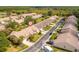 Street view of the neighborhood with attached houses and well-maintained landscaping at 1046 Almondwood Dr, Trinity, FL 34655