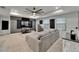 Spacious bonus room with ceiling fan, plush carpet, and entertainment area, perfect for relaxation and enjoyment at 11804 Harpswell Dr, Riverview, FL 33579