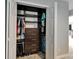 Organized closet space with custom shelving and storage, offering ample room for clothes and accessories at 11804 Harpswell Dr, Riverview, FL 33579