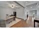 Spacious home office with hardwood floors, ceiling fan, and access to the rest of the house at 11804 Harpswell Dr, Riverview, FL 33579