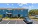Bright two-story townhome with manicured landscaping and parking in front at 12805 Kings Crossing Dr, Gibsonton, FL 33534