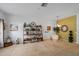 Living room featuring tasteful decorations, neutral colors, and plush carpeting at 12805 Kings Crossing Dr, Gibsonton, FL 33534