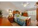 Comfortable main bedroom with a ceiling fan, a coordinated color scheme, and lots of natural light at 12805 Kings Crossing Dr, Gibsonton, FL 33534