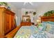 Bright main bedroom with lots of natural light, coordinated bedding, and lots of space for storage at 12805 Kings Crossing Dr, Gibsonton, FL 33534