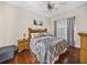 Spacious bedroom features a bed with decorative headboard and matching nightstands at 12902 Grand Traverse Dr, Dade City, FL 33525