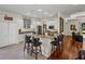 Modern kitchen with breakfast bar, granite countertops, stainless steel appliances and ample counter space at 12902 Grand Traverse Dr, Dade City, FL 33525