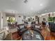 Inviting open-concept living space featuring elegant dining and an adjacent kitchen for seamless entertaining at 12902 Grand Traverse Dr, Dade City, FL 33525