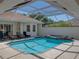 Beautiful screened-in pool and spa at 12902 Grand Traverse Dr, Dade City, FL 33525